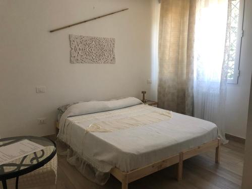 Ένα ή περισσότερα κρεβάτια σε δωμάτιο στο R&B MiDora Montale