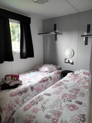 Postel nebo postele na pokoji v ubytování Domaine de Pimont