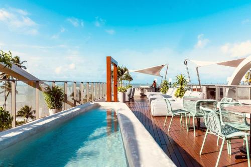 Πισίνα στο ή κοντά στο Luxo à beira-mar no Setai Yacht