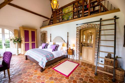 Ένα ή περισσότερα κρεβάτια σε δωμάτιο στο Domaine Ablon