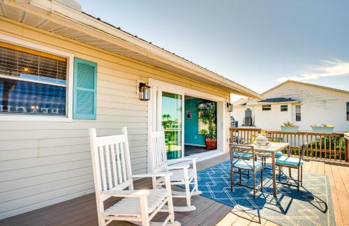 a patio with chairs and a table on a house at Waterfront Florida Escape with Deck and Private Dock! in Hernando Beach