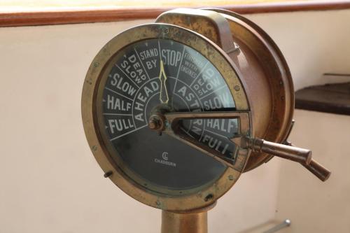 a clock on a pole in a room at Fingal Hotel in Edinburgh