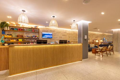 a lobby with a bar in a hospital at B&B HOTEL Rio Copacabana Posto 5 in Rio de Janeiro