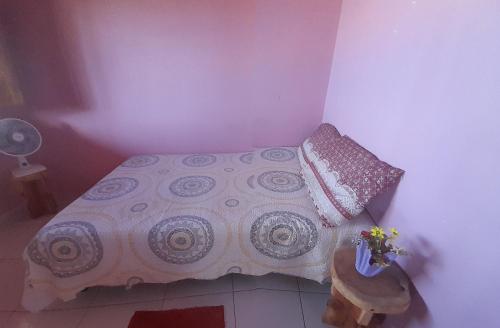 Postel nebo postele na pokoji v ubytování Csapenaareiaal quarto sem banheiro com vista pro mar