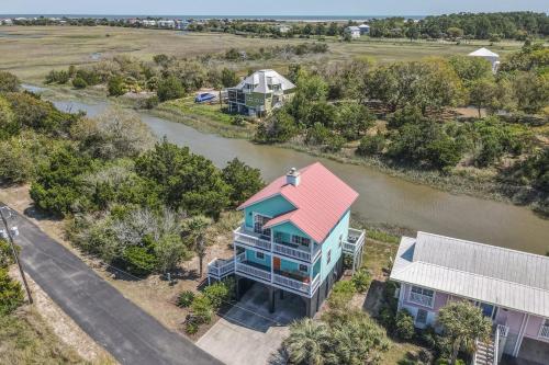 an aerial view of a house next to a river at The Oyster's Pearl - Wonderful Views in Harbour Key in Fripp Island