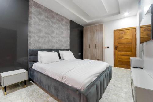 Postel nebo postele na pokoji v ubytování EasyStay Apartments