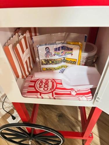 a cart filled with food on top of a table at Reno MidTown Movie House in Reno