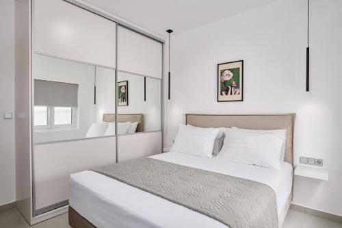 Ένα ή περισσότερα κρεβάτια σε δωμάτιο στο La Stella Apartment Thisio