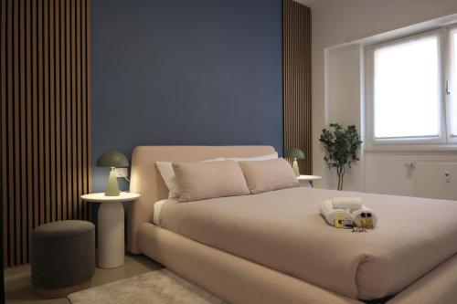 a bedroom with a bed and a window at La Boutique - 2 min walk to Bernina Express in Tirano