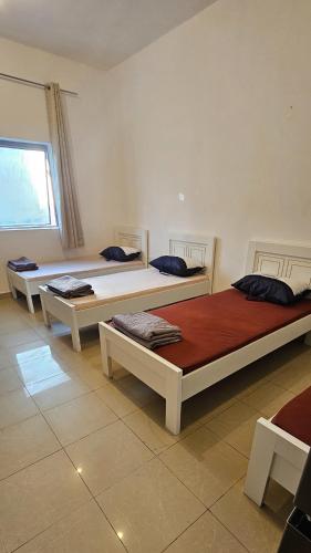Postel nebo postele na pokoji v ubytování Paradiso Hostel