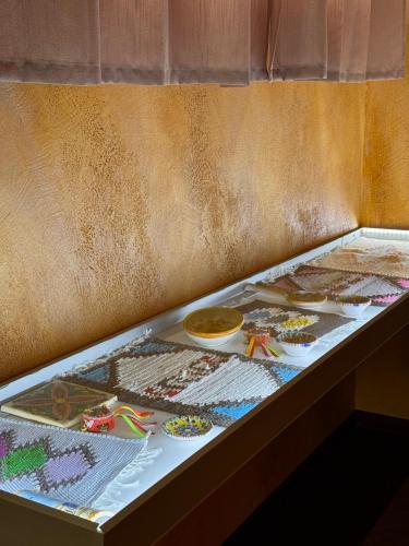 a table with many different types of food on at Summer Wind Apartments in Trapani
