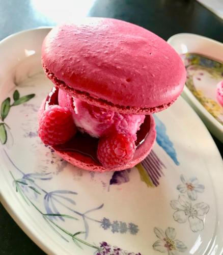 a pink dessert on a plate with a fork at Sans Souci Bed and Breakfast Luxe Heated Pool and Restaurant in Luzillé