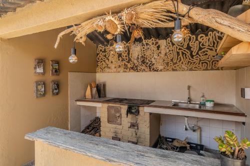 Kuchyň nebo kuchyňský kout v ubytování Naturaleza, Descanso y Fogata, Casa de Campo Romeros