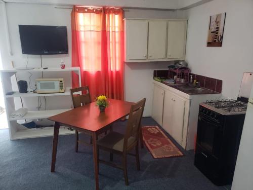 Η κουζίνα ή μικρή κουζίνα στο Alfred apartments