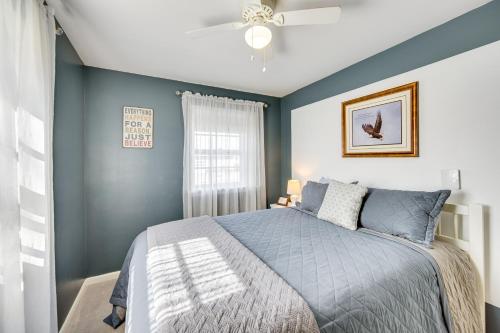 a bedroom with a bed and a ceiling fan at Schoolhouse Haven in Gap Communal Grill and Patio in Gap