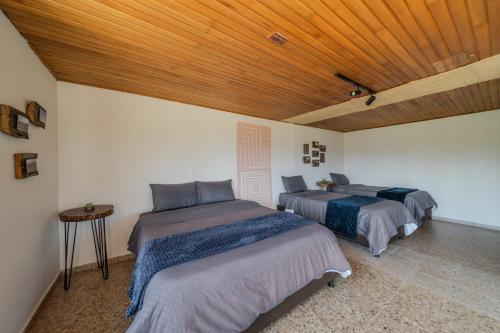 Katil atau katil-katil dalam bilik di Fogata Naturaleza y Descanso, Casa de Campo Eucaliptos