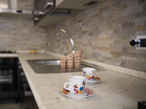 Η κουζίνα ή μικρή κουζίνα στο Sole&Mare Tropea