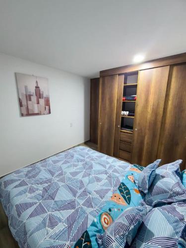 Postel nebo postele na pokoji v ubytování Amoblado Norte oncológico CTIC