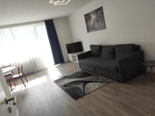 Ein Sitzbereich in der Unterkunft Appartment Messe