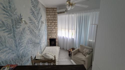 Posezení v ubytování Tu lugar en Rada Tilly