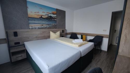 Postel nebo postele na pokoji v ubytování Hotel Stettiner Hof