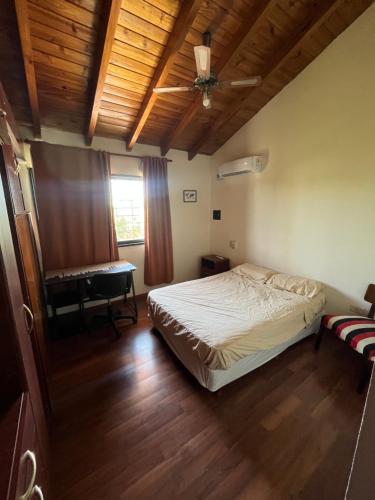 Postel nebo postele na pokoji v ubytování Casa amplia con Pileta