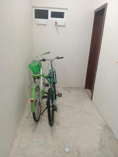 a bike parked in a room next to a wall at Villa Cayetano in Mahahual