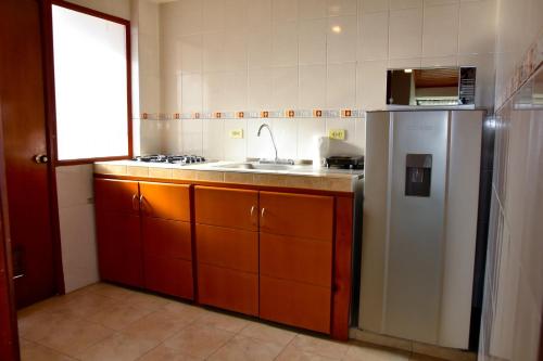 Kuchyň nebo kuchyňský kout v ubytování Apartahotel Doble3