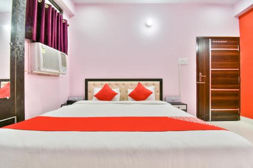 Ένα ή περισσότερα κρεβάτια σε δωμάτιο στο Hotel O Magadh Imperial