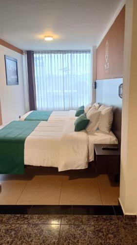 Ένα ή περισσότερα κρεβάτια σε δωμάτιο στο Hotel inka luxe casa rams