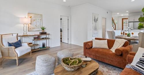 a living room with a brown couch and chairs at Villas at Bay Ridge Unit 7 in Jacksons Gap