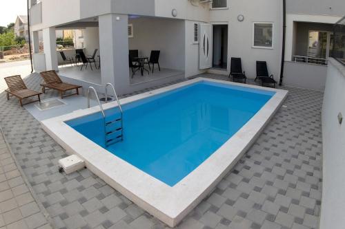 Family-friendly apartments with swimming pool Biograd na Moru, Biograd - 23912