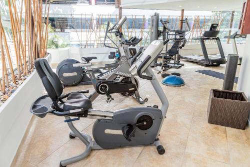 a gym with a row of exercise bikes at Four Points by Sheraton Medellín in Medellín