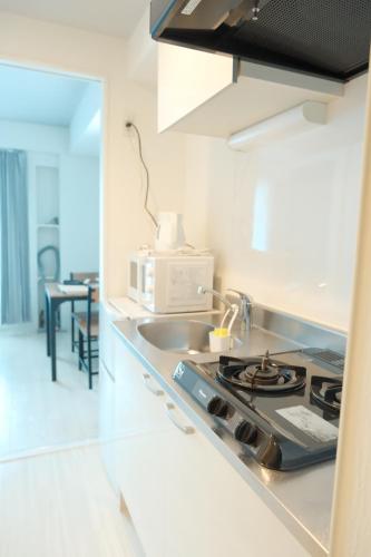 Kuchyň nebo kuchyňský kout v ubytování PLy