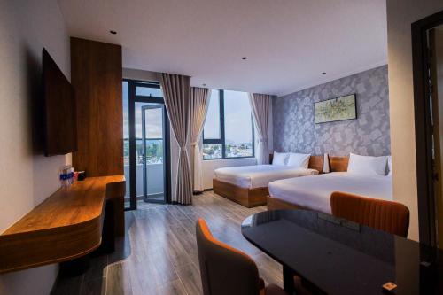 Katil atau katil-katil dalam bilik di Enjoy Apartment & Hotel