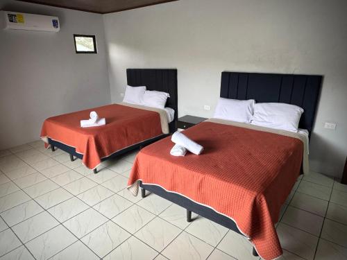 Katil atau katil-katil dalam bilik di Villa Jade La Fortuna, Family