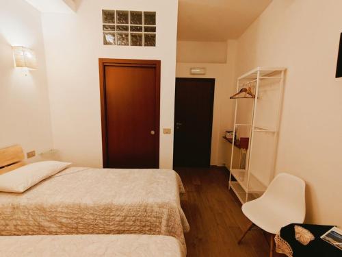 Postel nebo postele na pokoji v ubytování Le Corti