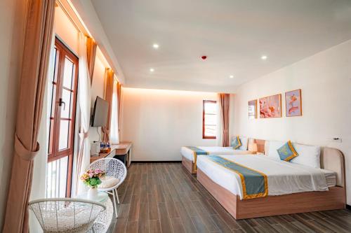 Postel nebo postele na pokoji v ubytování Lyn Hotel 2