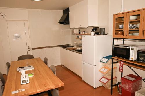 Cuisine ou kitchenette dans l'établissement ARBOLITO inn