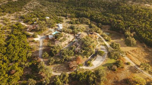an aerial view of a park with trees at Blair House Inn and Spa in Wimberley