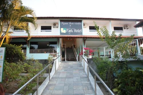 a building with a staircase leading up to it at Caruaru Park Hotel in Caruaru