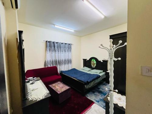 Llit o llits en una habitació de Holiday Home