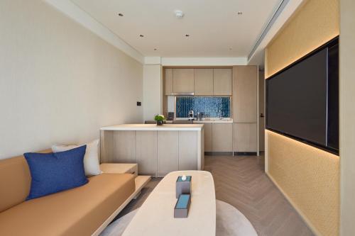 Televisyen dan/atau pusat hiburan di Ming Hotel Nanjing - MGallery Collection