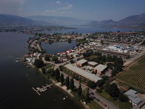 an aerial view of a town next to a body of water at Casa Del Mila Oro Condo in Osoyoos