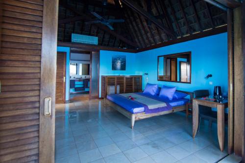 Una cama o camas en una habitación de Oa Oa Lodge