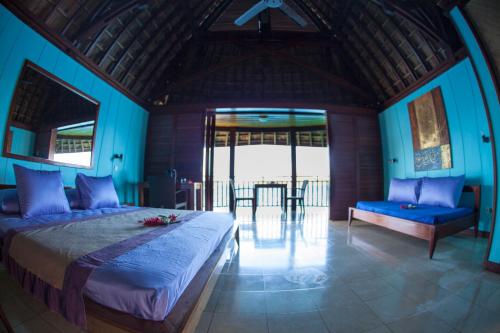 Una cama o camas en una habitación de Oa Oa Lodge