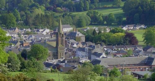 a small town with a church in a village at 5 lochview in Beattock