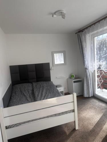 Postel nebo postele na pokoji v ubytování Willa Jola