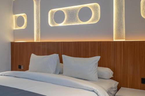 Кровать или кровати в номере Balidian II Loft 1 2BR