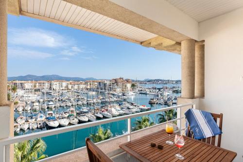 a balcony with a view of a marina at Mercure Thalasso & Spa Port Fréjus in Fréjus